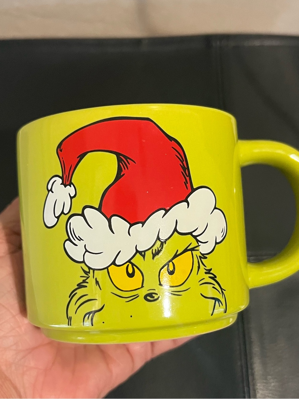 Two Ceramic green GRINCH coffee tea mug cups.